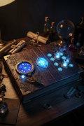 Heavy leather-bound spellbook with glowing blue gemstone on cover, cinematic lighting on oak desk